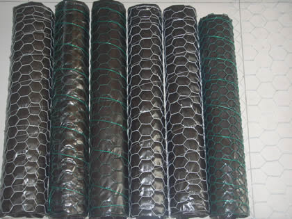 Three rolls of Electro galvanized coop wire and three rolls of green PVC coop wire.
