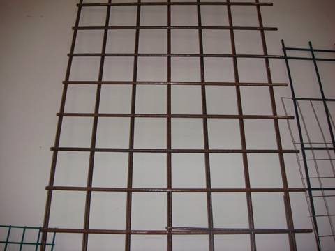 A piece of floor heating mesh with square holes is made of low carbon steel.