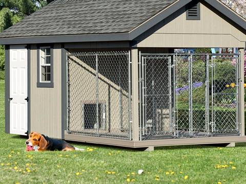 This is a kennel with chain link mesh panels and posts.