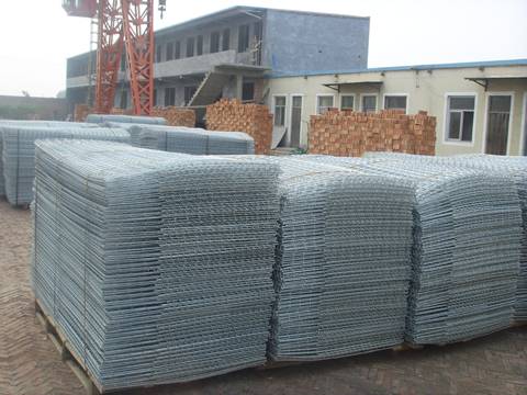 Many stacks of uninstalled gabion mesh is placed in workshop.