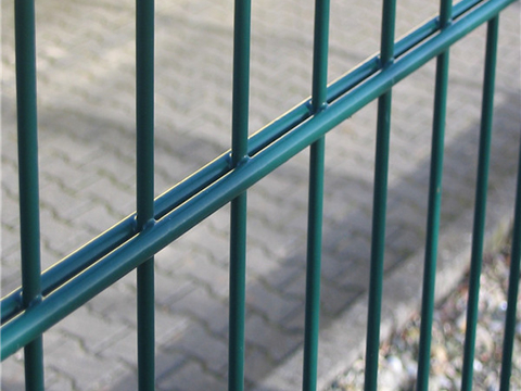 This is a green PVC double wire fence.