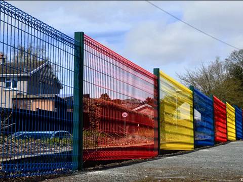 There are many BRC fences with various colors in the community.