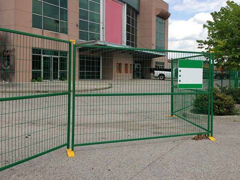 This is a office building with Canada portable fence.