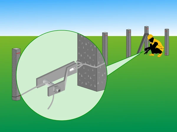 A person passing the tension wire through the center hole of the tensioner