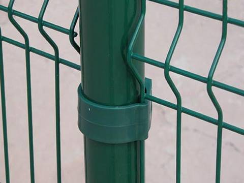 PVC coated green round post is used to support curvy fence panel.