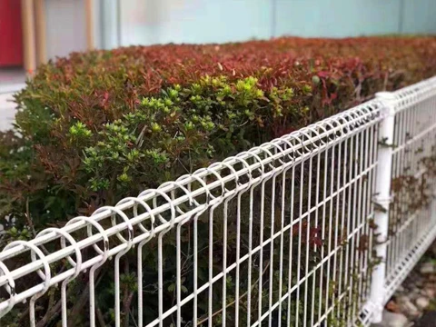 Decorative double ring garden fence for the protection of unit green spaces