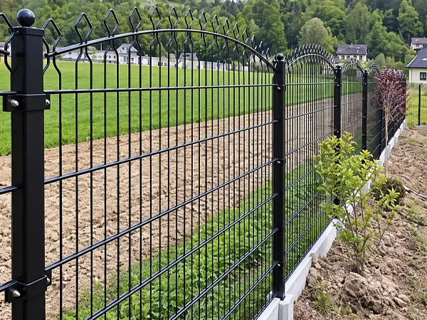 Decorative double wire fence used in a landscaped area.