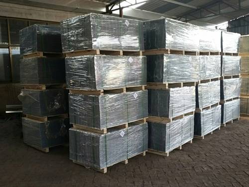 Several pallets of floor heating mesh with plastic film wrapped in the warehouse.