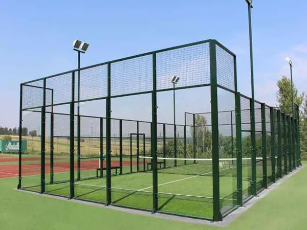 Green outdoor panoramic padel court.
