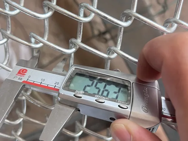 Mini chain link mesh opening size measurement.