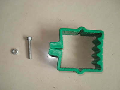 A green post clip, a silver white screw and a nut.