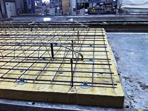 Precast reinforcing mesh used in the foundation of a building.