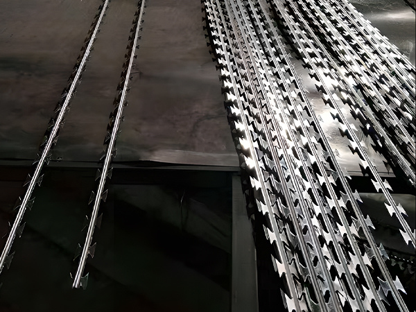 A batch of straight line razor wire fence placed on the factory desktop
