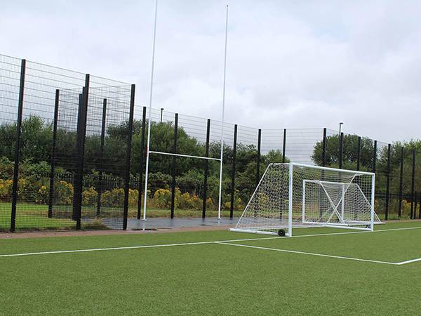 Soccer field with twin wire rebound fencing installed