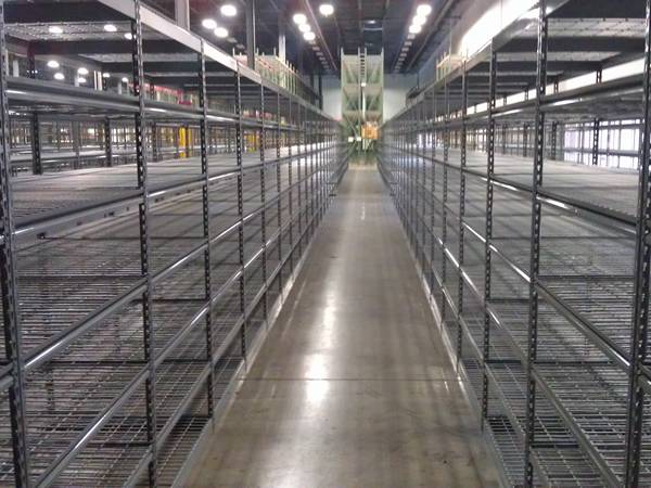Many wire shelves placed in the warehouse.