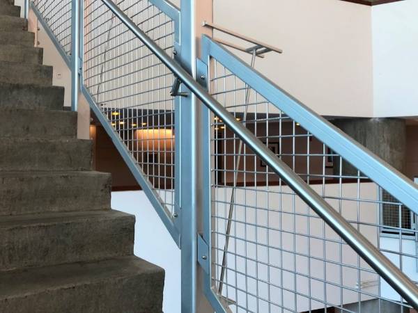 The welded mesh infill panels are installed on the stairs
