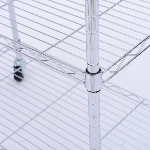 A corner of welded wire shelf is supported by heavy-duty posts.