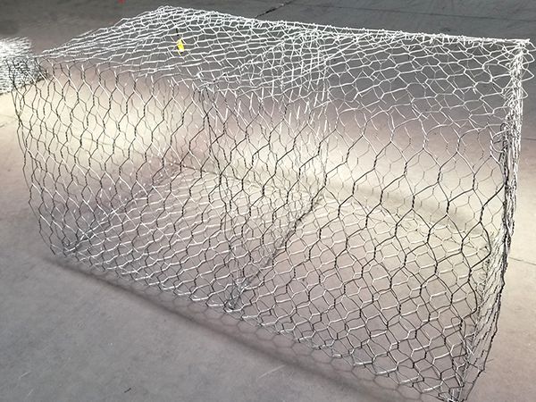 Woven gabion basket is placed on the ground of the factory.